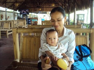 Teacher Nguyễn Thị Bích Hạnh and her son
