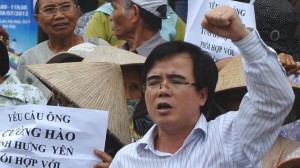 This picture taken on July 8, 2012 shows lawyer Le Quoc Quan (C) shouting during an anti-China rally in Hanoi (AFP/FILE)