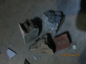 Stones, bricks used to throw at writer Huynh Ngoc Tuan