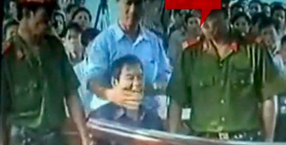 Father Nguyen Van Ly at Vietnam’s Kangaroo Court on 30 March 2007. Photo from youtube.com