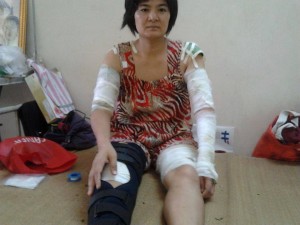 Ms Tran Thi Nga was beaten up savagely by undercover policemen pretending to be gang members 