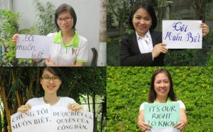 Vietnamese bloggers display signs demanding government transparency in a “We Want to Know” campaign, Sept. 2, 2014.  Photo courtesy of the Network of Vietnamese Bloggers.