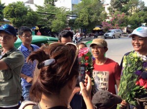 Music compositor Viet Khang (in red T-shirt) welcomed by activists