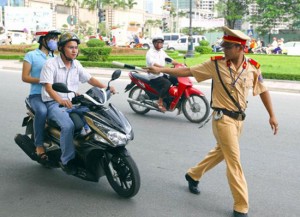 Police stop citizens with motorbike for administrative checking