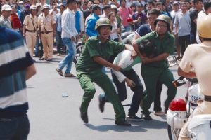 Security forces violently detain environmentalist during peaceful demonstration in HCMC on May 8, 2016