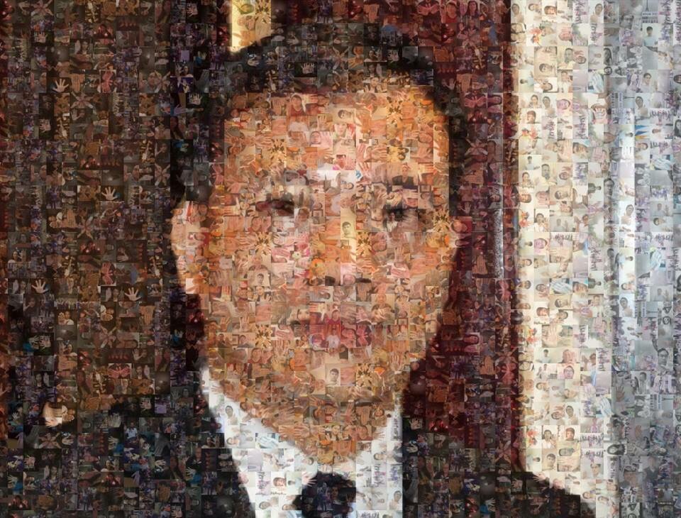 The Nguyen Van Dai photo collaged by 600 photos of human rights hands