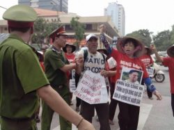Mrs. Can Thi Theu at a peaceful demonstration in Hanoi